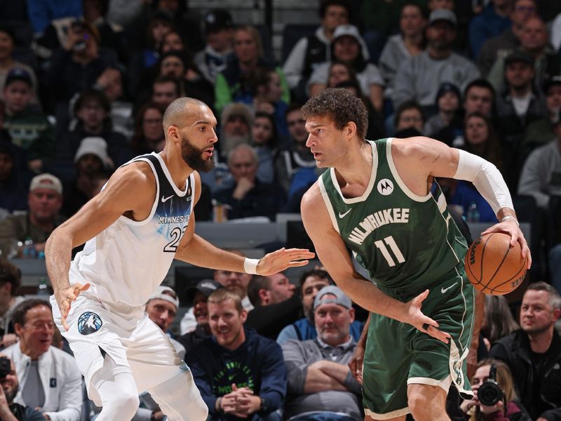 MINNEAPOLIS, MN -  FEBRUARY 12: Brook Lopez #11 of the Milwaukee Bucks handles the ball during the game against the Minnesota Timberwolves on February 12, 2025 at Target Center in Minneapolis, Minnesota. NOTE TO USER: User expressly acknowledges and agrees that, by downloading and or using this Photograph, user is consenting to the terms and conditions of the Getty Images License Agreement. Mandatory Copyright Notice: Copyright 2025 NBAE (Photo by David Sherman/NBAE via Getty Images)