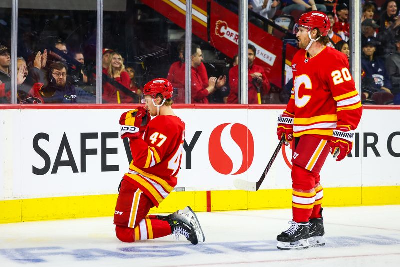 Sep 23, 2024; Calgary, Alberta, CAN; Calgary Flames center Connor Zary (47) scores a goal against Edmonton Oilers during the second period at Scotiabank Saddledome. Mandatory Credit: Sergei Belski-Imagn Images