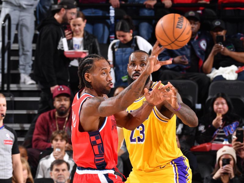 INGLEWOOD, CA - FEBRUARY 4: Kawhi Leonard #2 of the LA Clippers passes the ball during the game against the Los Angeles Lakers on February 4, 2025 at Intuit Dome in Los Angeles, California. NOTE TO USER: User expressly acknowledges and agrees that, by downloading and/or using this Photograph, user is consenting to the terms and conditions of the Getty Images License Agreement. Mandatory Copyright Notice: Copyright 2025 NBAE (Photo by Juan Ocampo/NBAE via Getty Images)