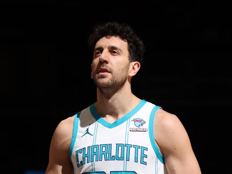 WASHINGTON, DC -? MARCH 8:  Vasilije Micic #22 of the Charlotte Hornets shoots a free throw during the game on March 8, 2024 at Capital One Arena in Washington, DC. NOTE TO USER: User expressly acknowledges and agrees that, by downloading and or using this Photograph, user is consenting to the terms and conditions of the Getty Images License Agreement. Mandatory Copyright Notice: Copyright 2024 NBAE (Photo by Stephen Gosling/NBAE via Getty Images)