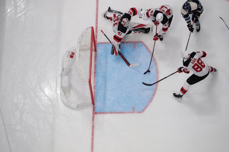 Jan 19, 2024; Columbus, Ohio, USA; New Jersey Devils defenseman Luke Hughes (43) clears the rebound of a Columbus Blue Jackets shot attempt during the third period at Nationwide Arena. Mandatory Credit: Russell LaBounty-USA TODAY Sports