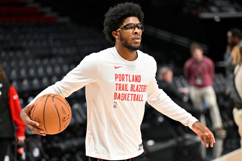 PORTLAND, OREGON - FEBRUARY 10: Scoot Henderson #00 of the Portland Trail Blazers warms up before the game against the New Orleans Pelicans at the Moda Center on February 10, 2024 in Portland, Oregon. NOTE TO USER: User expressly acknowledges and agrees that, by downloading and or using this photograph, User is consenting to the terms and conditions of the Getty Images License Agreement. (Photo by Alika Jenner/Getty Images)