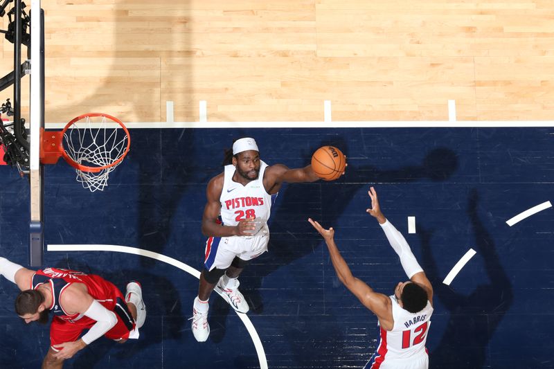 WASHINGTON, DC -? NOVEMBER 17: Isaiah Stewart #28 of the Detroit Pistons rebounds the ball during the game against the Washington Wizards on November 17, 2024 at Capital One Arena in Washington, DC. NOTE TO USER: User expressly acknowledges and agrees that, by downloading and or using this Photograph, user is consenting to the terms and conditions of the Getty Images License Agreement. Mandatory Copyright Notice: Copyright 2024 NBAE (Photo by Stephen Gosling/NBAE via Getty Images)