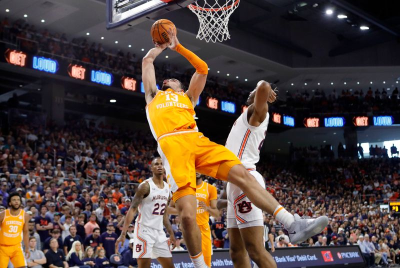 Mar 4, 2023; Auburn, Alabama, USA;  Tennessee Volunteers forward Olivier Nkamhoua (13) shoots the ball against the Auburn Tigers during the first half at Neville Arena. Mandatory Credit: John Reed-USA TODAY Sports