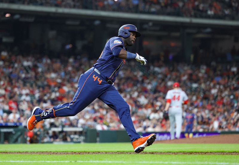 Jun 3, 2024; Houston, Texas, USA; St. Louis Cardinals starting pitcher Kyle Gibson (44) reacts and Houston Astros designated hitter Yordan Alvarez (44) runs to first base on a double during the sixth inning at Minute Maid Park. Mandatory Credit: Troy Taormina-USA TODAY Sports