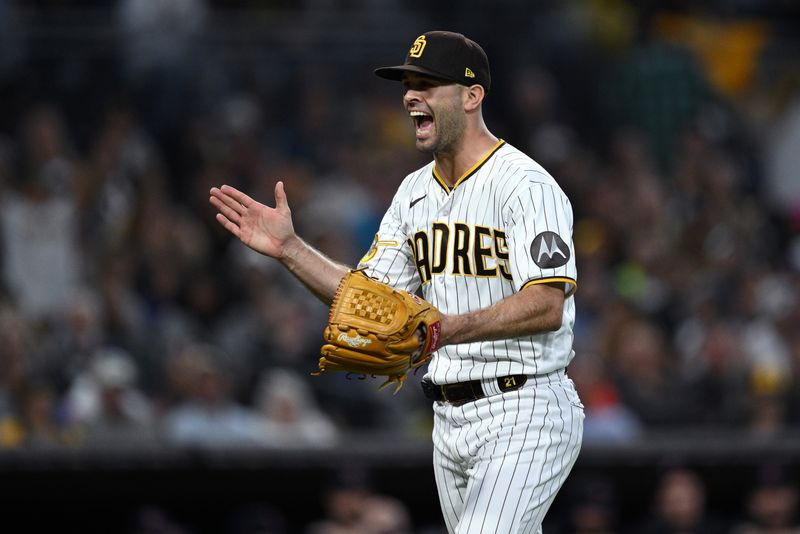 Jun 15, 2023; San Diego, California, USA; San Diego Padres relief pitcher Nick Martinez (21) reacts after the last out of the top of the seventh inning was recorded against the Cleveland Guardians at Petco Park. Mandatory Credit: Orlando Ramirez-USA TODAY Sports