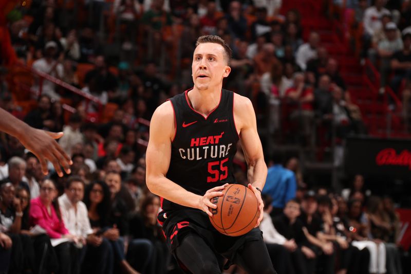 MIAMI, FL - JANUARY 24:  Duncan Robinson #55 of the Miami Heat handles the ball during the game against the Memphis Grizzlies on January 24, 2024 at Kaseya Center in Miami, Florida. NOTE TO USER: User expressly acknowledges and agrees that, by downloading and or using this Photograph, user is consenting to the terms and conditions of the Getty Images License Agreement. Mandatory Copyright Notice: Copyright 2024 NBAE (Photo by Issac Baldizon/NBAE via Getty Images)