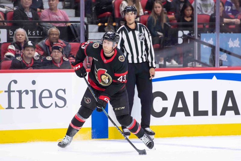 Oct 19, 2024; Ottawa, Ontario, CAN; Ottawa Senators defenseman Tyler Kleven (43) shoots the puck in the first period against the Tampa Bay Lightning at the Canadian Tire Centre. Mandatory Credit: Marc DesRosiers-Imagn Images