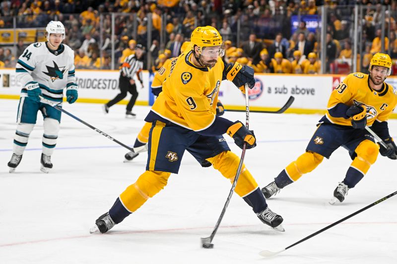 Oct 21, 2023; Nashville, Tennessee, USA; Nashville Predators left wing Filip Forsberg (9) takes shot on goal against the San Jose Sharks during the first period at Bridgestone Arena. Mandatory Credit: Steve Roberts-USA TODAY Sports