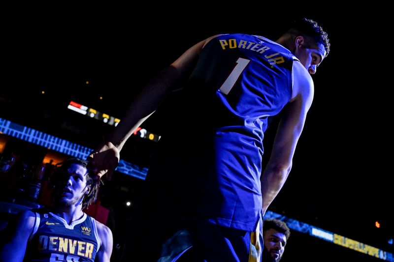 DENVER, CO - JANUARY 17: Michael Porter Jr. (1) of the Denver Nuggets prepares to be introduced before the first quarter against the Portland Trail Blazers at Ball Arena in Denver on Tuesday, January 17, 2023. (Photo by AAron Ontiveroz/MediaNews Group/The Denver Post via Getty Images)