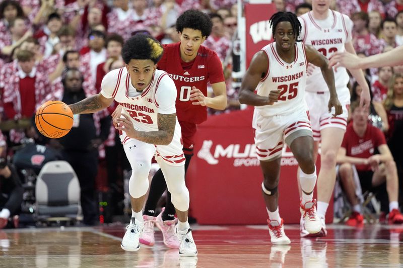 Mar 7, 2024; Madison, Wisconsin, USA; Wisconsin Badgers guard Chucky Hepburn (23) dribbles the ball after stealing the ball from the Rutgers Scarlet Knights during the second half at the Kohl Center. Mandatory Credit: Kayla Wolf-USA TODAY Sports