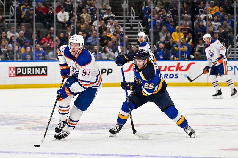 Feb 15, 2024; St. Louis, Missouri, USA;  Edmonton Oilers center Connor McDavid (97) controls the puck against the St. Louis Blues during the first period at Enterprise Center. Mandatory Credit: Jeff Curry-USA TODAY Sports