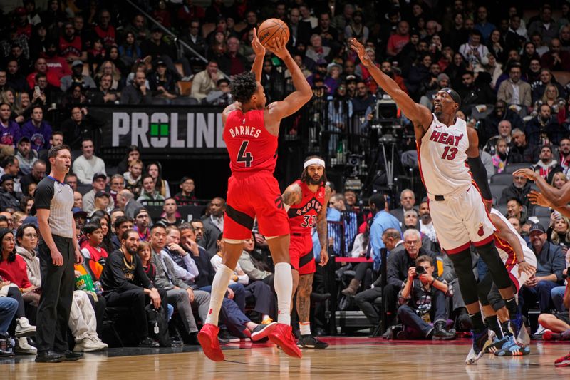 TORONTO, CANADA - JANUARY 17: Scottie Barnes #4 of the Toronto Raptors shoots the ball during the game against the Miami Heat on January 17, 2024 at the Scotiabank Arena in Toronto, Ontario, Canada.  NOTE TO USER: User expressly acknowledges and agrees that, by downloading and or using this Photograph, user is consenting to the terms and conditions of the Getty Images License Agreement.  Mandatory Copyright Notice: Copyright 2024 NBAE (Photo by Mark Blinch/NBAE via Getty Images)