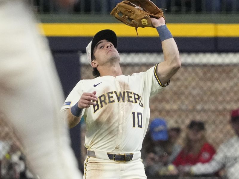 May 18, 2025; Milwaukee, Wisconsin, USA; Milwaukee Brewers outfielder Sal Frelick (10) catches a fly ball against the Minnesota Twins in the eighth inning at American Family Field. Mandatory Credit: Michael McLoone-Imagn Images