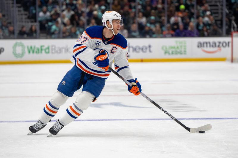 Oct 25, 2025; Seattle, Washington, USA; Edmonton Oilers forward Connor McDavid (97) skates with the puck during the first period against the Seattle Kraken at Climate Pledge Arena. Mandatory Credit: Stephen Brashear-Imagn Images