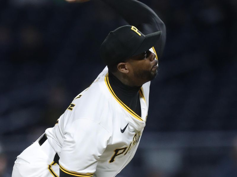 Apr 8, 2024; Pittsburgh, Pennsylvania, USA;  Pittsburgh Pirates relief pitcher Aroldis Chapman (45) pitches against the Detroit Tigers during the eighth inning at PNC Park. Mandatory Credit: Charles LeClaire-USA TODAY Sports