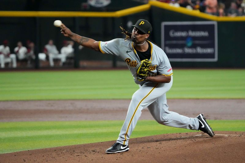 Jul 26, 2024; Phoenix, Arizona, USA; Pittsburgh Pirates pitcher Luis L. Ortiz (48) pitches against the Arizona Diamondbacks during the first inning at Chase Field. Mandatory Credit: Joe Camporeale-USA TODAY Sports