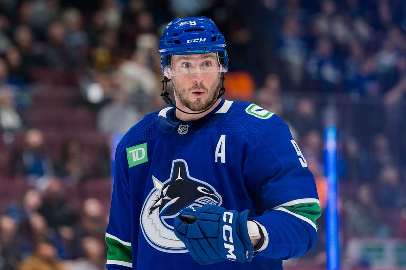 Apr 6, 2023; Vancouver, British Columbia, CAN; Vancouver Canucks forward J.T. Miller (9) during a stop in play against the Chicago Blackhawks in the second period at Rogers Arena. Mandatory Credit: Bob Frid-USA TODAY Sports