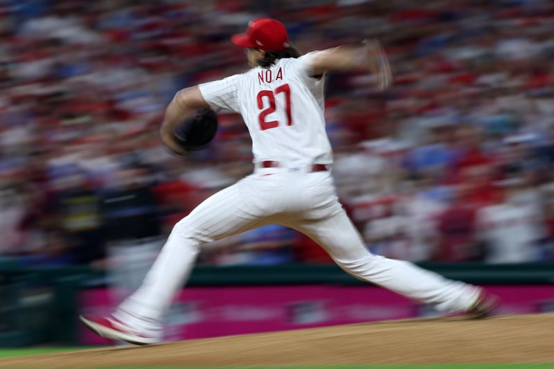 Oct 4, 2023; Philadelphia, Pennsylvania, USA; Philadelphia Phillies starting pitcher Aaron Nola (27) throws a pitch against the Miami Marlins during the first inning for game two of the Wildcard series for the 2023 MLB playoffs at Citizens Bank Park. Mandatory Credit: Bill Streicher-USA TODAY Sports