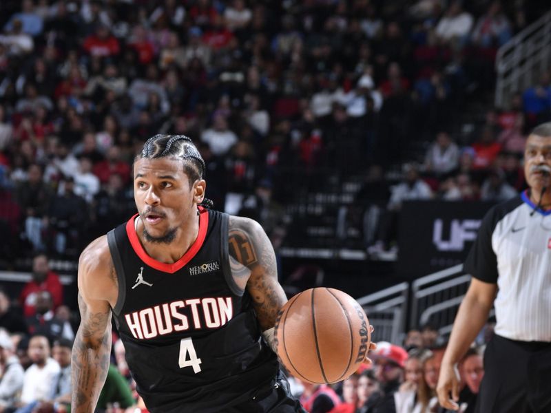 HOUSTON, TX - JANUARY 13:  Jalen Green #4 of the Houston Rockets dribbles the ball during the game against the Memphis Grizzlies  on January 13, 2025 at the Toyota Center in Houston, Texas. NOTE TO USER: User expressly acknowledges and agrees that, by downloading and or using this photograph, User is consenting to the terms and conditions of the Getty Images License Agreement. Mandatory Copyright Notice: Copyright 2024 NBAE (Photo by Logan Riely/NBAE via Getty Images)