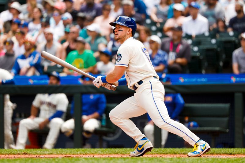 Jul 16, 2023; Seattle, Washington, USA; Seattle Mariners left fielder Jarred Kelenic (10) hits an RBI-double against the Detroit Tigers during the first inning at T-Mobile Park. Mandatory Credit: Joe Nicholson-USA TODAY Sports