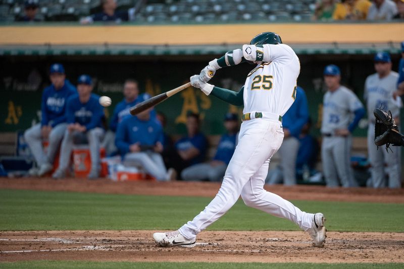 Aug 22, 2023; Oakland, California, USA; Oakland Athletics left fielder Brent Rooker (25) hits a single during the third inning against the Kansas City Royals at Oakland-Alameda County Coliseum. Mandatory Credit: Ed Szczepanski-USA TODAY Sports