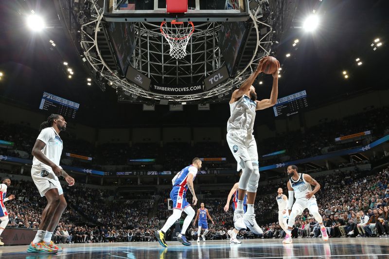 MINNEAPOLIS, MN -  NOVEMBER 27: Rudy Gobert #27 of the Minnesota Timberwolves grabs the rebound during the game against the Sacramento Kings on November 27, 2024 at Target Center in Minneapolis, Minnesota. NOTE TO USER: User expressly acknowledges and agrees that, by downloading and or using this Photograph, user is consenting to the terms and conditions of the Getty Images License Agreement. Mandatory Copyright Notice: Copyright 2024 NBAE (Photo by David Sherman/NBAE via Getty Images)