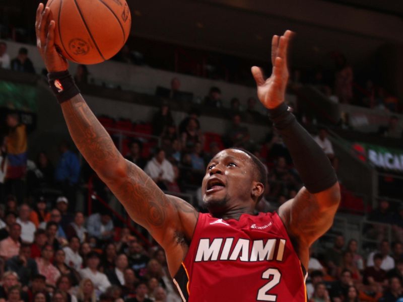 MIAMI, FL - MARCH 10: Terry Rozier III #2 of the Miami Heat drives to the basket during the game against the Washington Wizards on March 10, 2024 at Kaseya Center in Miami, Florida. NOTE TO USER: User expressly acknowledges and agrees that, by downloading and or using this Photograph, user is consenting to the terms and conditions of the Getty Images License Agreement. Mandatory Copyright Notice: Copyright 2024 NBAE (Photo by Issac Baldizon/NBAE via Getty Images)