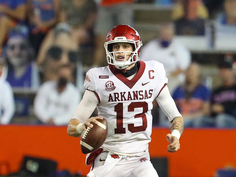 Nov 14, 2020; Gainesville, FL, USA;  Arkansas Razorbacks quarterback Feleipe Franks (13) runs with the ball against Florida at Ben Hill Griffin Stadium. Mandatory Credit: Brad McClenny-USA TODAY NETWORK