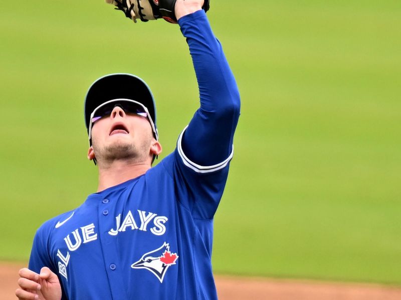 Feb 25, 2025; Dunedin, Florida, USA; Toronto Blue Jays first baseman Will Wagner (7) catches a fly ball against the St. Louis Cardinals in the third inning of a spring training game at TD Ballpark. Mandatory Credit: Jonathan Dyer-Imagn Images