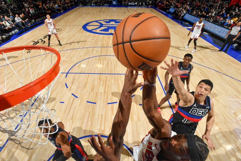 DETROIT, MI - MARCH 15: Jimmy Butler #22 of the Miami Heat shoots the ball during the game against the Detroit Pistons on March 15, 2024 at Little Caesars Arena in Detroit, Michigan. NOTE TO USER: User expressly acknowledges and agrees that, by downloading and/or using this photograph, User is consenting to the terms and conditions of the Getty Images License Agreement. Mandatory Copyright Notice: Copyright 2024 NBAE (Photo by Chris Schwegler/NBAE via Getty Images)