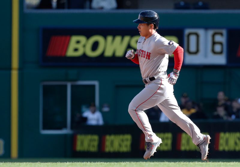 Apr 20, 2024; Pittsburgh, Pennsylvania, USA;  Boston Red Sox designated hitter  Masataka Yoshida (7) circles the bases on a two run home run against he Pittsburgh Pirates during the sixth inning at PNC Park. Mandatory Credit: Charles LeClaire-USA TODAY Sports