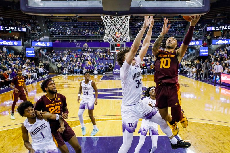 Jan 26, 2023; Seattle, Washington, USA; Arizona State Sun Devils guard Frankie Collins (10) scores a layup against Washington Huskies center Braxton Meah (34) during overtime at Alaska Airlines Arena at Hec Edmundson Pavilion. Mandatory Credit: Joe Nicholson-USA TODAY Sports