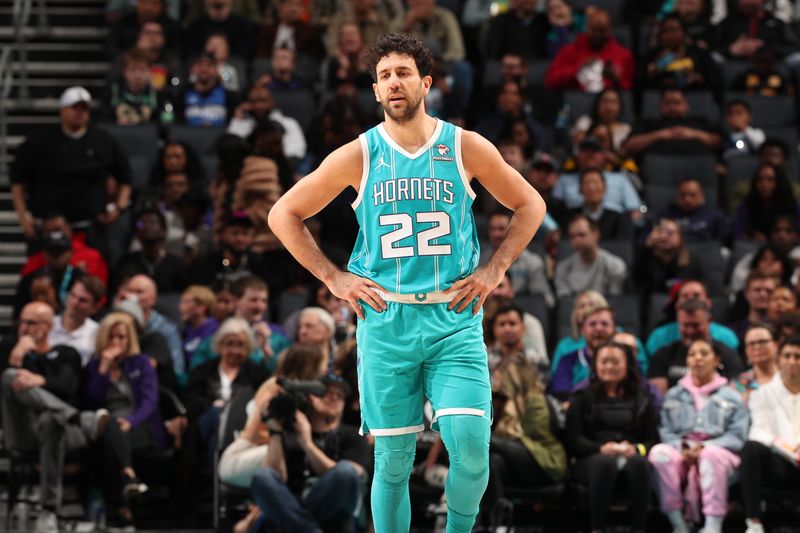 CHARLOTTE, NC - APRIL 5: Vasilije Micic #22 of the Charlotte Hornets looks on during the game against the Orlando Magic on April 5, 2024 at Spectrum Center in Charlotte, North Carolina. NOTE TO USER: User expressly acknowledges and agrees that, by downloading and or using this photograph, User is consenting to the terms and conditions of the Getty Images License Agreement. Mandatory Copyright Notice: Copyright 2024 NBAE (Photo by Kent Smith/NBAE via Getty Images)