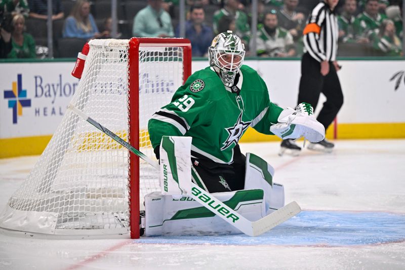 Oct 15, 2024; Dallas, Texas, USA; Dallas Stars goaltender Jake Oettinger (29) faces the San Jose Sharks attack during the first period at the American Airlines Center. Mandatory Credit: Jerome Miron-Imagn Images