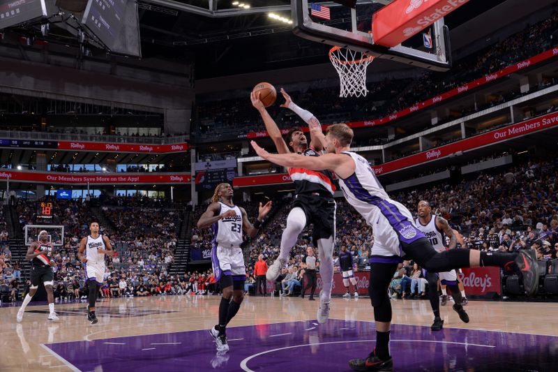 SACRAMENTO, CA - OCTOBER 13: Deni Avdija #8 of the Portland Trail Blazers drives to the basket during the game against the Sacramento Kings during a NBA preseason game on October 13, 2024 at Golden 1 Center in Sacramento, California. NOTE TO USER: User expressly acknowledges and agrees that, by downloading and or using this Photograph, user is consenting to the terms and conditions of the Getty Images License Agreement. Mandatory Copyright Notice: Copyright 2024 NBAE (Photo by Rocky Widner/NBAE via Getty Images)