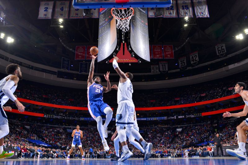 PHILADELPHIA, PA - FEBRUARY 23: Joel Embiid #21 of the Philadelphia 76ers shoots the ball during the game against the Memphis Grizzlies on February 23, 2023 at the Wells Fargo Center in Philadelphia, Pennsylvania NOTE TO USER: User expressly acknowledges and agrees that, by downloading and/or using this Photograph, user is consenting to the terms and conditions of the Getty Images License Agreement. Mandatory Copyright Notice: Copyright 2023 NBAE (Photo by Jesse D. Garrabrant/NBAE via Getty Images)