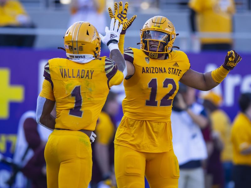 Nov 19, 2022; Tempe, Arizona, USA; Arizona State Sun Devils running back Xazavian Valladay (1) celebrates with tight end Jalin Conyers (12) after scoring a touchdown against the Oregon State Beavers during the first half at Sun Devil Stadium. Mandatory Credit: Mark J. Rebilas-USA TODAY Sports