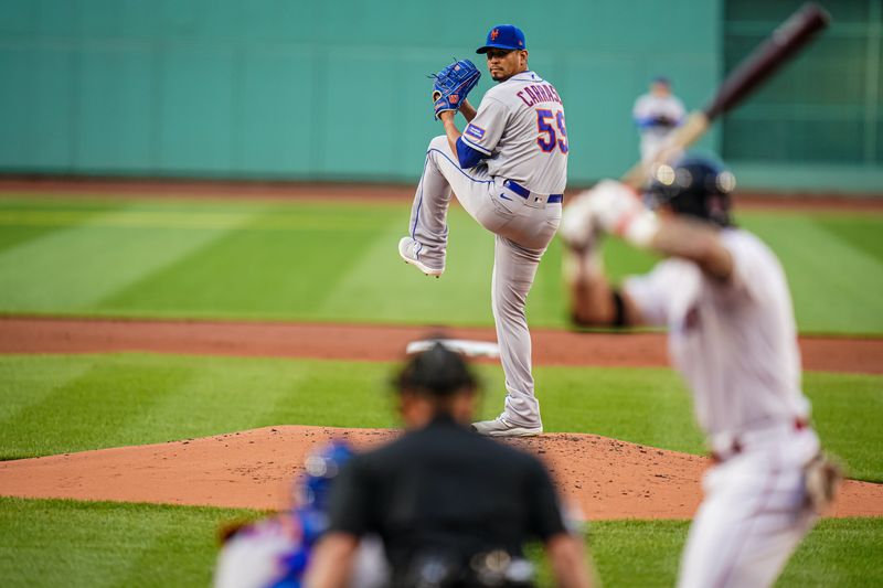 Jul 23, 2023; Boston, Massachusetts, USA; New York Mets starting pitcher Carlos Carrasco (59) throws a pitch against the Boston Red Sox in the first inning at Fenway Park. Mandatory Credit: David Butler II-USA TODAY Sports