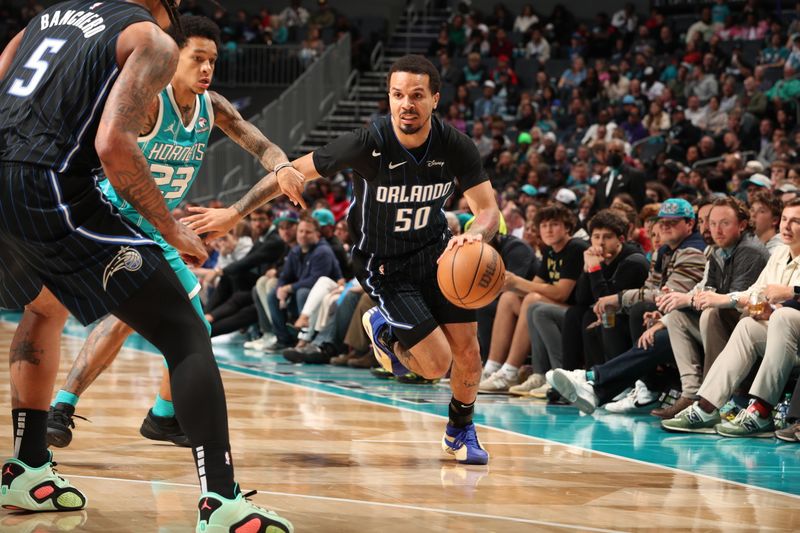 CHARLOTTE, NC - APRIL 5: Cole Anthony #50 of the Orlando Magic handles the ball during the game against the Charlotte Hornets on April 5, 2024 at Spectrum Center in Charlotte, North Carolina. NOTE TO USER: User expressly acknowledges and agrees that, by downloading and or using this photograph, User is consenting to the terms and conditions of the Getty Images License Agreement. Mandatory Copyright Notice: Copyright 2024 NBAE (Photo by Kent Smith/NBAE via Getty Images)