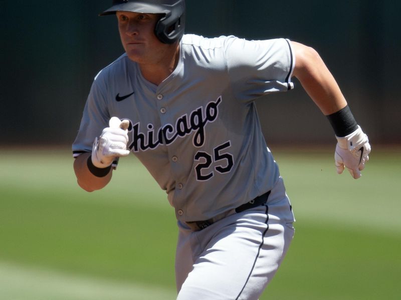 Aug 7, 2024; Oakland, California, USA; Chicago White Sox first baseman Andrew Vaughn (25) advances to third base after Oakland Athletics right fielder Lawrence Butler (not pictured) misplayed a ball hit for a double by Vaughn during the second inning at Oakland-Alameda County Coliseum. Mandatory Credit: D. Ross Cameron-USA TODAY Sports