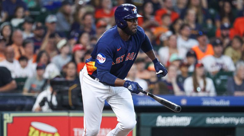 Sep 10, 2023; Houston, Texas, USA; Houston Astros left fielder Yordan Alvarez (44) hits a single during the first inning against the San Diego Padres at Minute Maid Park. Mandatory Credit: Troy Taormina-USA TODAY Sports