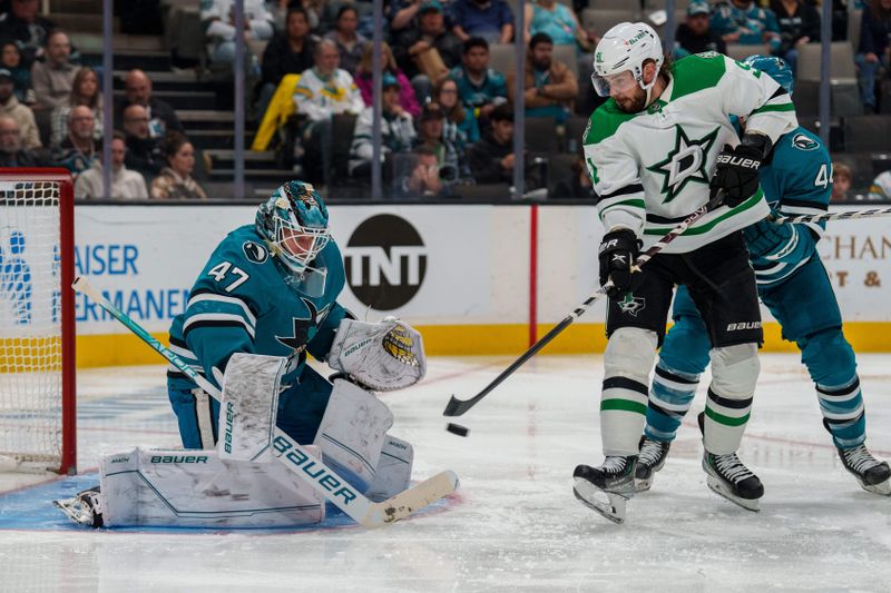 Jan 18, 2023; San Jose, California, USA;  San Jose Sharks goaltender James Reimer (47) makes a save in front of Dallas Stars center Tyler Seguin (91) during the third period at SAP Center at San Jose. Mandatory Credit: Neville E. Guard-USA TODAY Sports