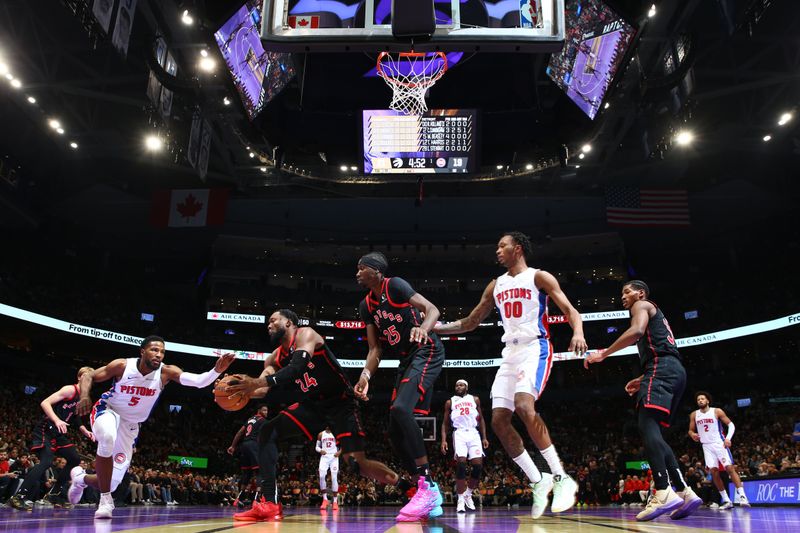 TORONTO, CANADA - NOVEMBER 15: Bruno Fernando #24 of the Toronto Raptors handles the ball during the game against the Detroit Pistons during the Emirates NBA Cup game on November 15, 2024 at the Scotiabank Arena in Toronto, Ontario, Canada.  NOTE TO USER: User expressly acknowledges and agrees that, by downloading and or using this Photograph, user is consenting to the terms and conditions of the Getty Images License Agreement.  Mandatory Copyright Notice: Copyright 2024 NBAE (Photo by Vaughn Ridley/NBAE via Getty Images)