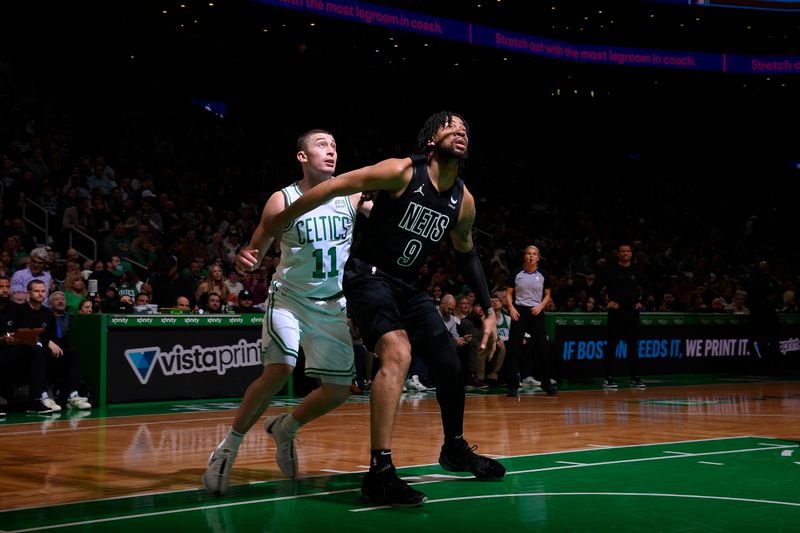 BOSTON, MA - FEBRUARY 14: Trendon Watford #9 of the Brooklyn Nets and Payton Pritchard #11 of the Boston Celtics battle for position on February 14, 2024 at the TD Garden in Boston, Massachusetts. NOTE TO USER: User expressly acknowledges and agrees that, by downloading and or using this photograph, User is consenting to the terms and conditions of the Getty Images License Agreement. Mandatory Copyright Notice: Copyright 2024 NBAE  (Photo by Brian Babineau/NBAE via Getty Images)