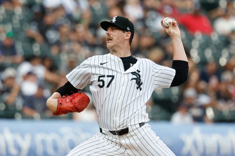 Aug 24, 2024; Chicago, Illinois, USA; Chicago White Sox starting pitcher Ky Bush (57) delivers a pitch against the Detroit Tigers during the first inning at Guaranteed Rate Field. Mandatory Credit: Kamil Krzaczynski-USA TODAY Sports