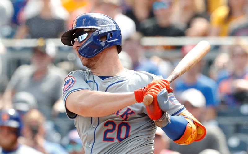 Jul 7, 2024; Pittsburgh, Pennsylvania, USA;  New York Mets first baseman Pete Alonso (20) at bat against the Pittsburgh Pirates during the eighth inning at PNC Park. The Mets won 3-2. Mandatory Credit: Charles LeClaire-USA TODAY Sports
