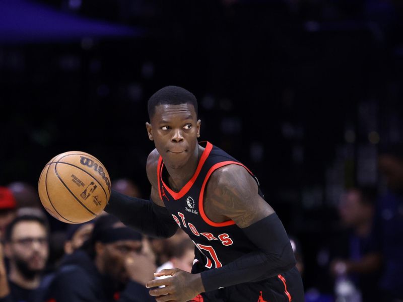 PHILADELPHIA, PENNSYLVANIA - DECEMBER 22: Dennis Schroder #17 of the Toronto Raptors dribbles during the second quarter against the Philadelphia 76ers at the Wells Fargo Center on December 22, 2023 in Philadelphia, Pennsylvania. NOTE TO USER: User expressly acknowledges and agrees that, by downloading and or using this photograph, User is consenting to the terms and conditions of the Getty Images License Agreement. (Photo by Tim Nwachukwu/Getty Images)