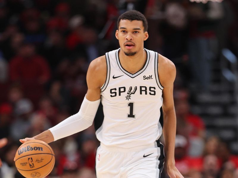 CHICAGO, ILLINOIS - DECEMBER 21: Victor Wembanyama #1 of the San Antonio Spurs dribbles up the court against the Chicago Bulls during the first half at the United Center on December 21, 2023 in Chicago, Illinois. NOTE TO USER: User expressly acknowledges and agrees that, by downloading and or using this photograph, User is consenting to the terms and conditions of the Getty Images License Agreement.  (Photo by Michael Reaves/Getty Images)