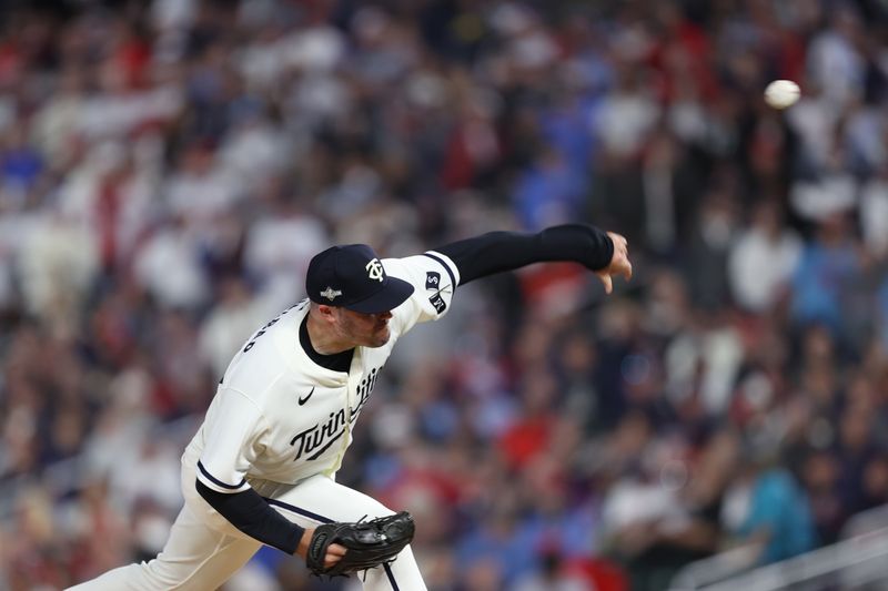 Oct 11, 2023; Minneapolis, Minnesota, USA; Minnesota Twins relief pitcher Caleb Thielbar (56) pitches in the fourth inning against the Houston Astros during game four of the ALDS for the 2023 MLB playoffs at Target Field. Mandatory Credit: Jesse Johnson-USA TODAY Sports